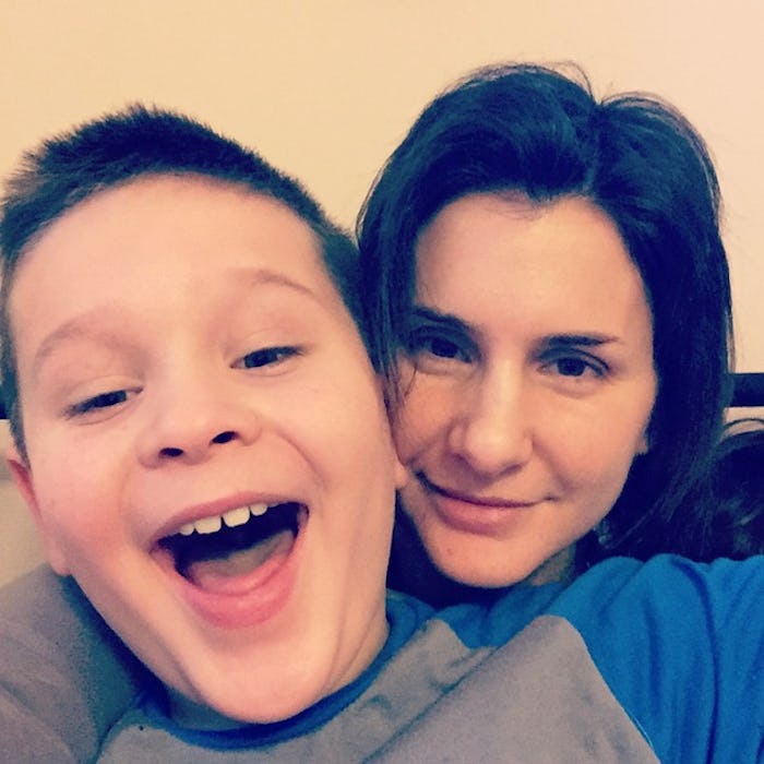 A mother with bipolar disorder taking a selfie with her son
