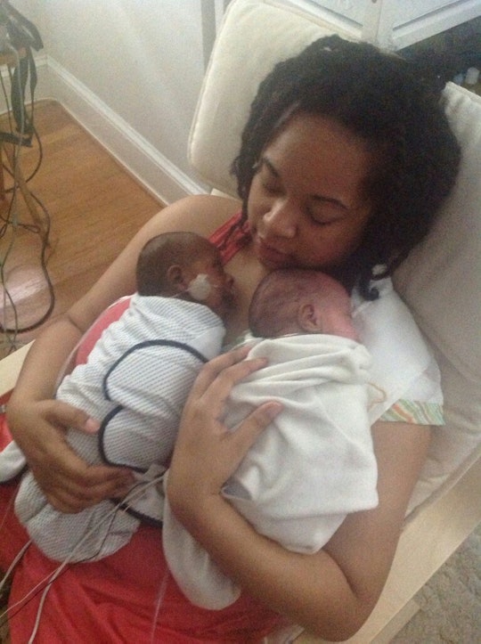 Tyrese L. Coleman, who was told by an NICU nurse not to breastfeed, holding her twins on her chest