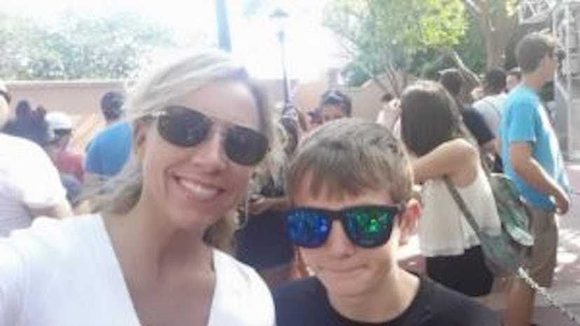 A Florida mom taking a selfie with her son, both wearing sunglasses