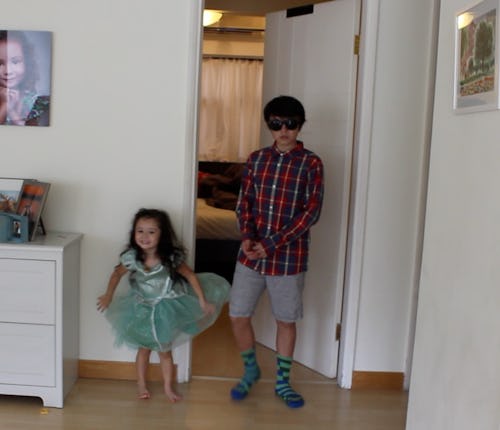 An older brother and a 3-year-old fashion-obsessed sister posing for a photo