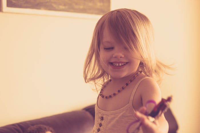 3-year-old daughter playing at home