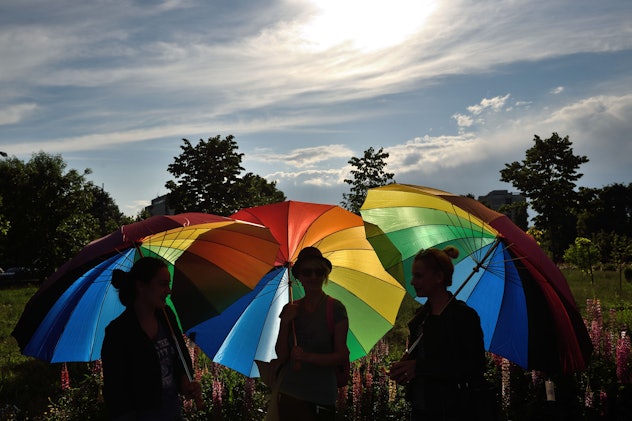 rainbow umbrellas at sunset , lgbtq+ pride month poems 