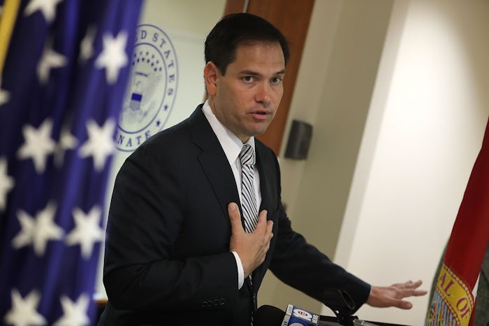 Marco Rubio during a speech in front of a USA flag