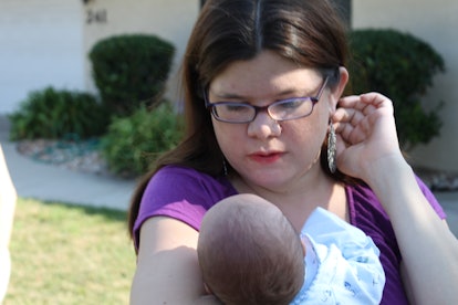 Samantha Taylor holding her baby