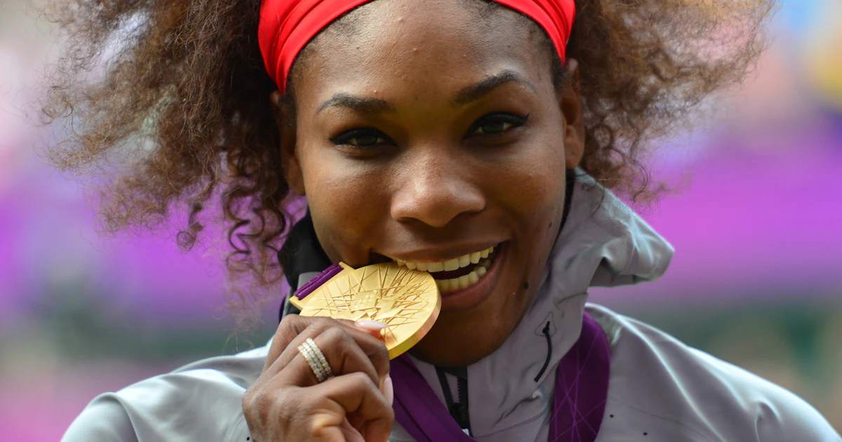 Why Do Olympians Bite Their Gold Medals It s An Unofficial Olympic why-do-olympians-bite-their-gold-medals-it-s-an-unofficial-olympic