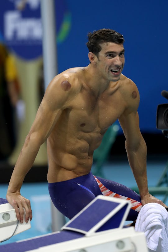 How Many Tattoos Does Michael Phelps Have? He Keeps Them (Mostly) Hidden