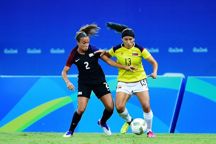 Mallory Pugh #2 of the United States and Angela Clavijo #13 of Colombia racing for the ball