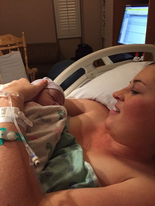 A woman is holding her newborn on her chest after labor.