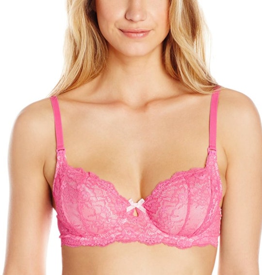 Woman wearing a pink comfortable nursing bra