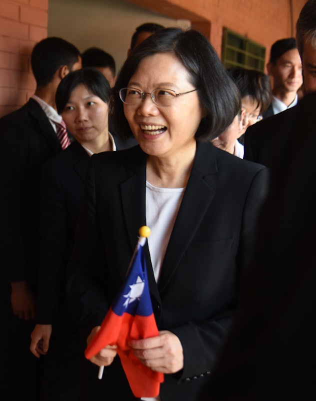 Tsai Ing-Wen smiling in a white shirt and a black blazer