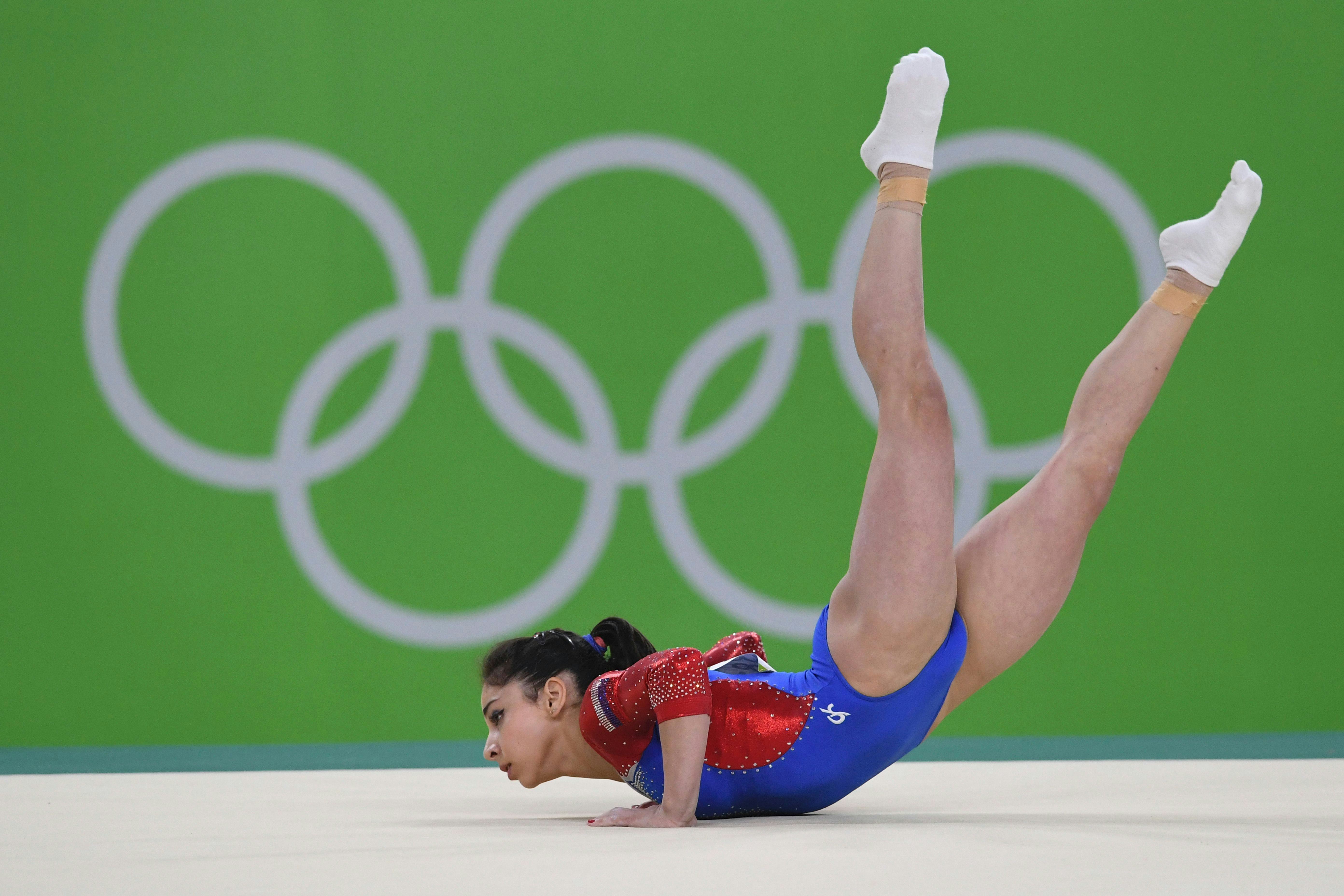 Why Do Gymnasts Wear Socks On The Floor Exercise? An Investigation