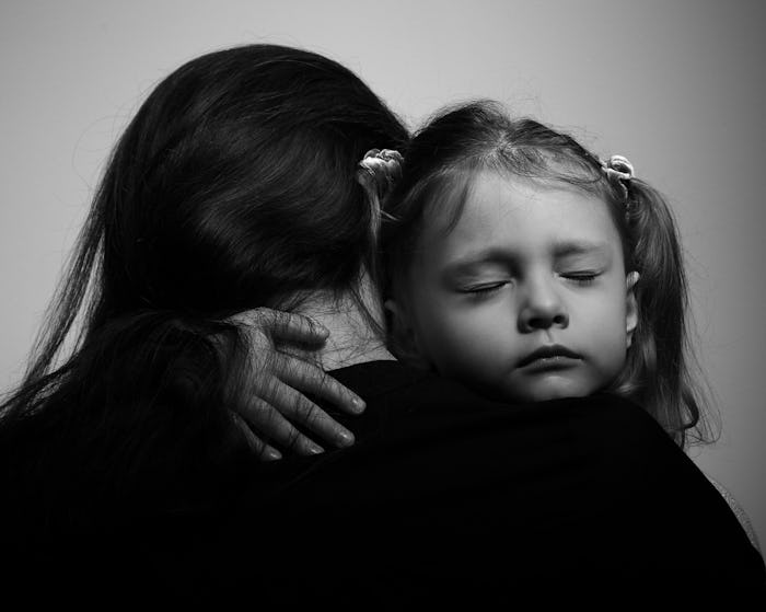 A mother experiencing loneliness holding her daughter who is hugging her