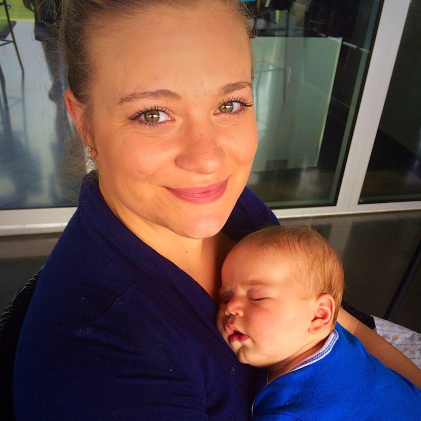 Erin Heger holding her baby