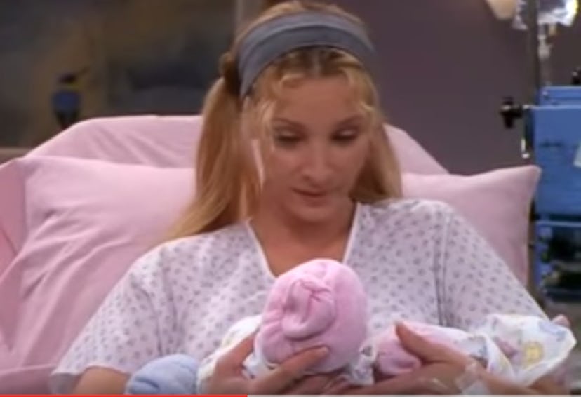 Phoebe looking at the babies she gave birth to for her brother in Friends 
