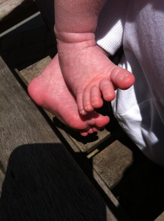 Long foot fingers of a baby