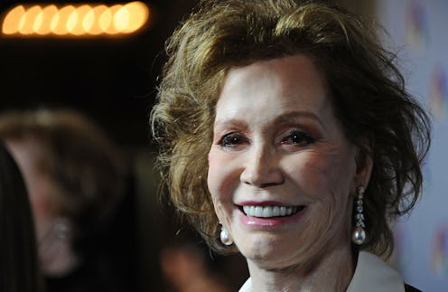 A closeup of Mary Tyler Moore smiling at an event