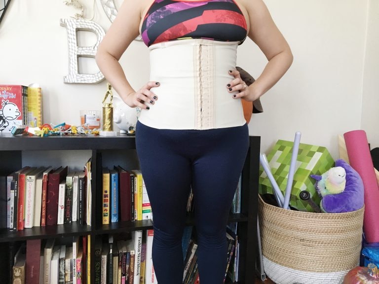 Wearing waist discount trainer after birth