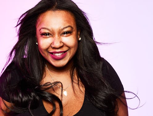 A woman smiling and being mindful