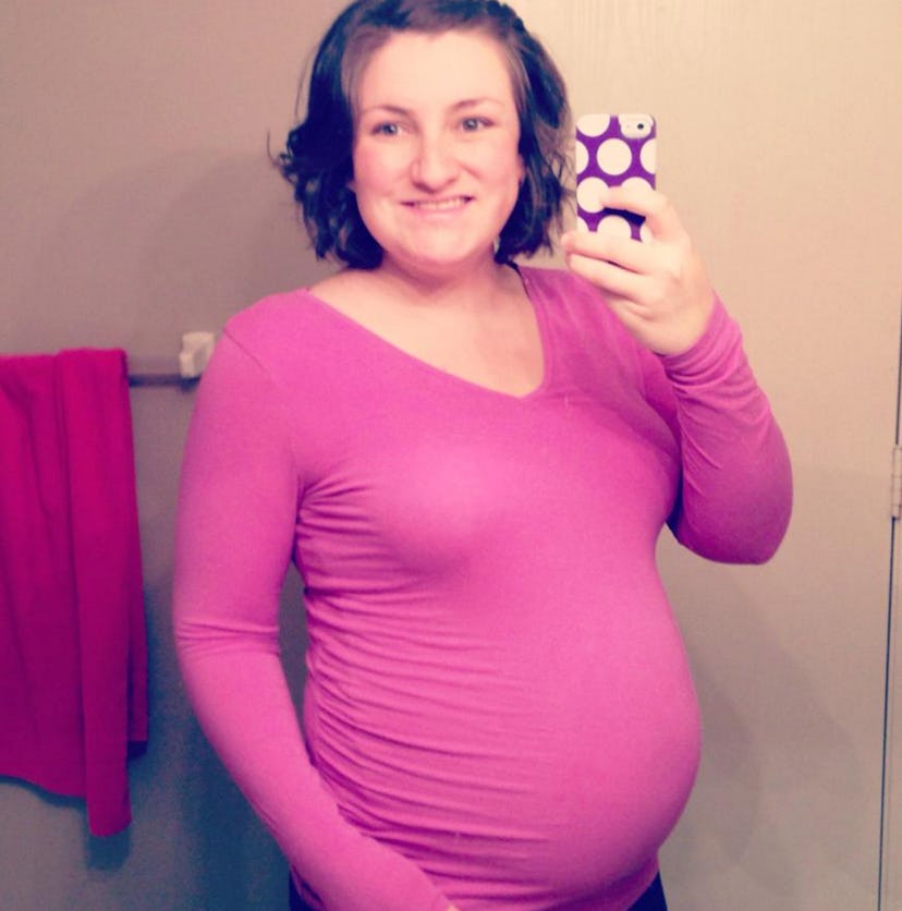 Image of the author, Ashley, posing in front of the mirror