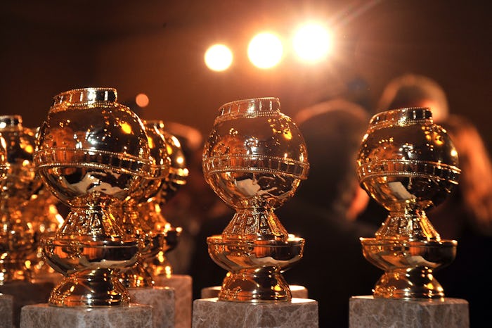 Several Golden Globes award sculptures places next to each other