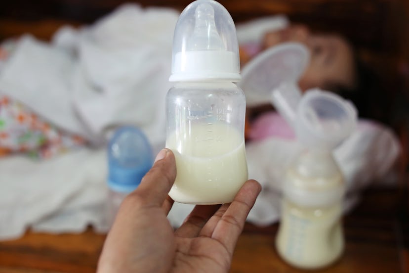 A baby bottle full of breast milk
