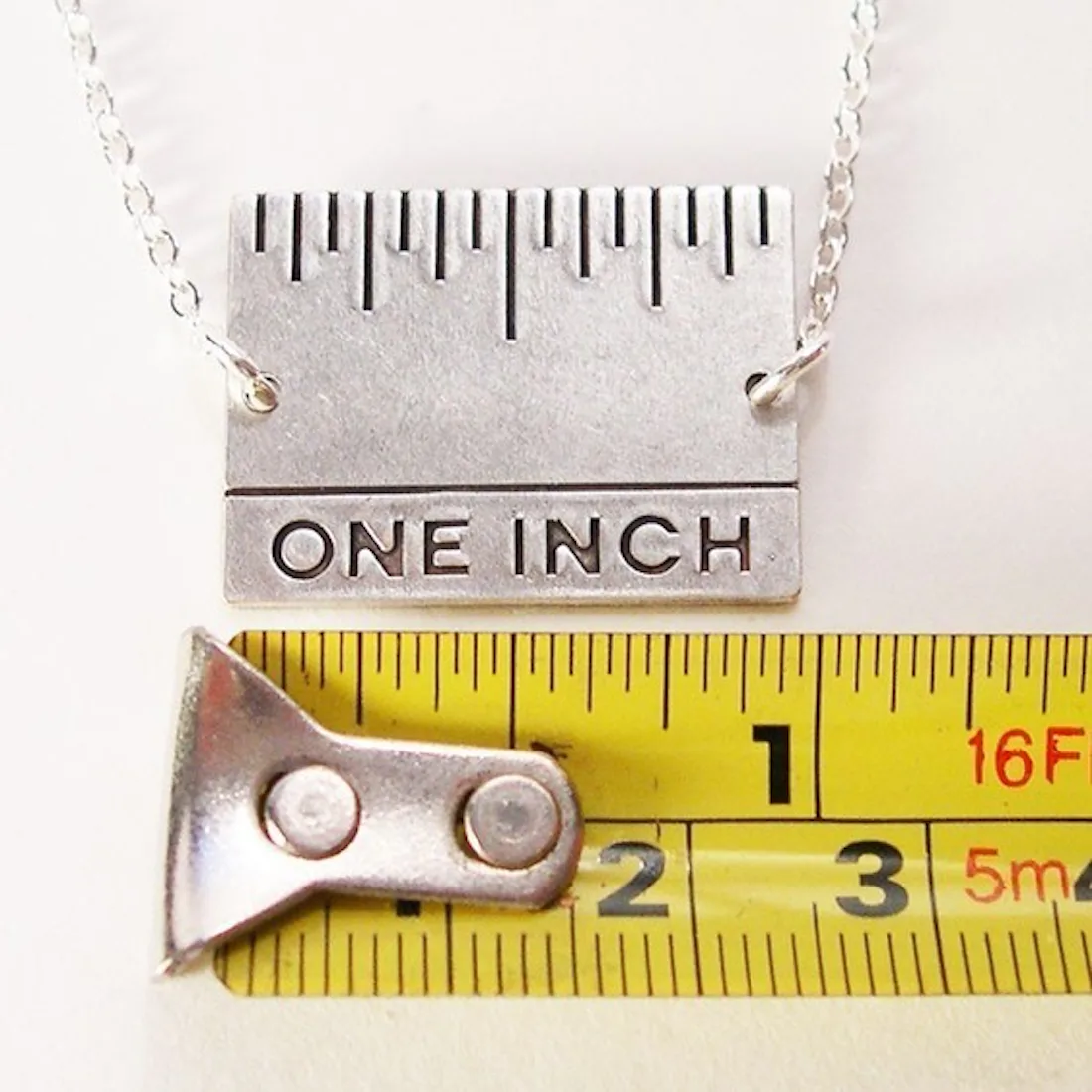 9 Multi-Functional Jewelry Pieces That Do More Than Just Spruce Up Your ...