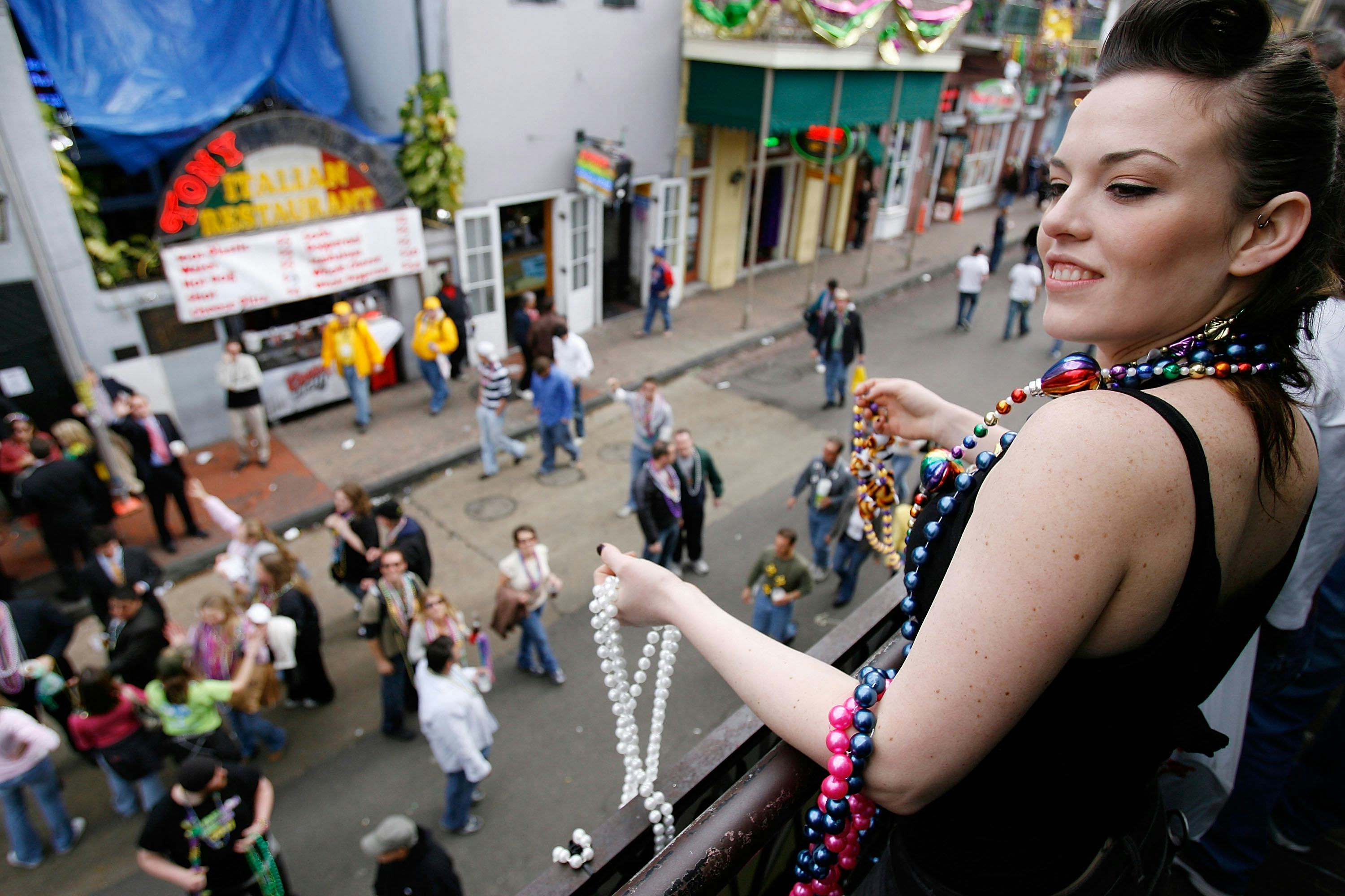 Why Do People Throw Beads At Mardi Gras? The Tradition Has Its Historic