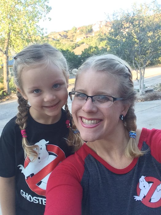 Mom and her daughter rocking two braids hairstyle and posing for a selfie