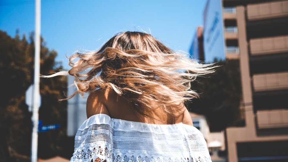 9 Ways To Make Your Hair Grow Faster According To Experts
