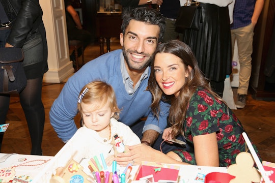 Justin Baldoni, his wife, and their child posing together for one of his Instas