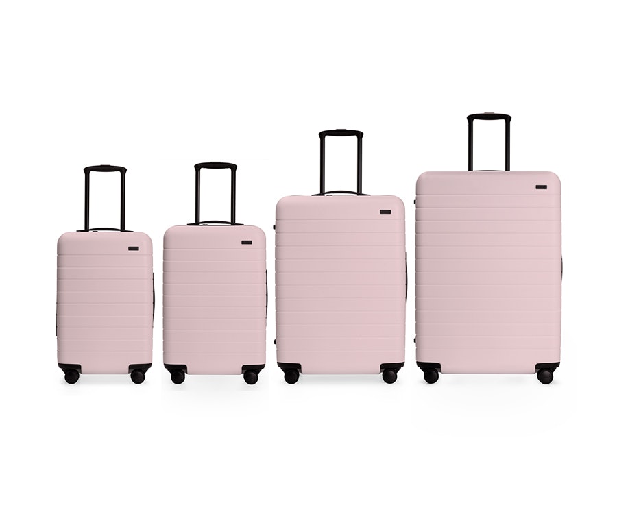 tripp raspberry cabin suitcase