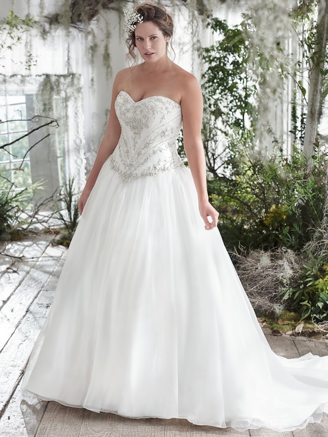 11 Plus Size Wedding Dresses That Are All Unique & Absolutely