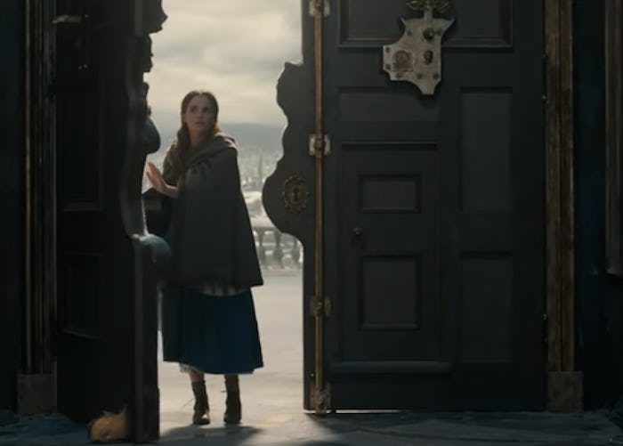 Emma Watson opening a door in Beauty and the Beast 