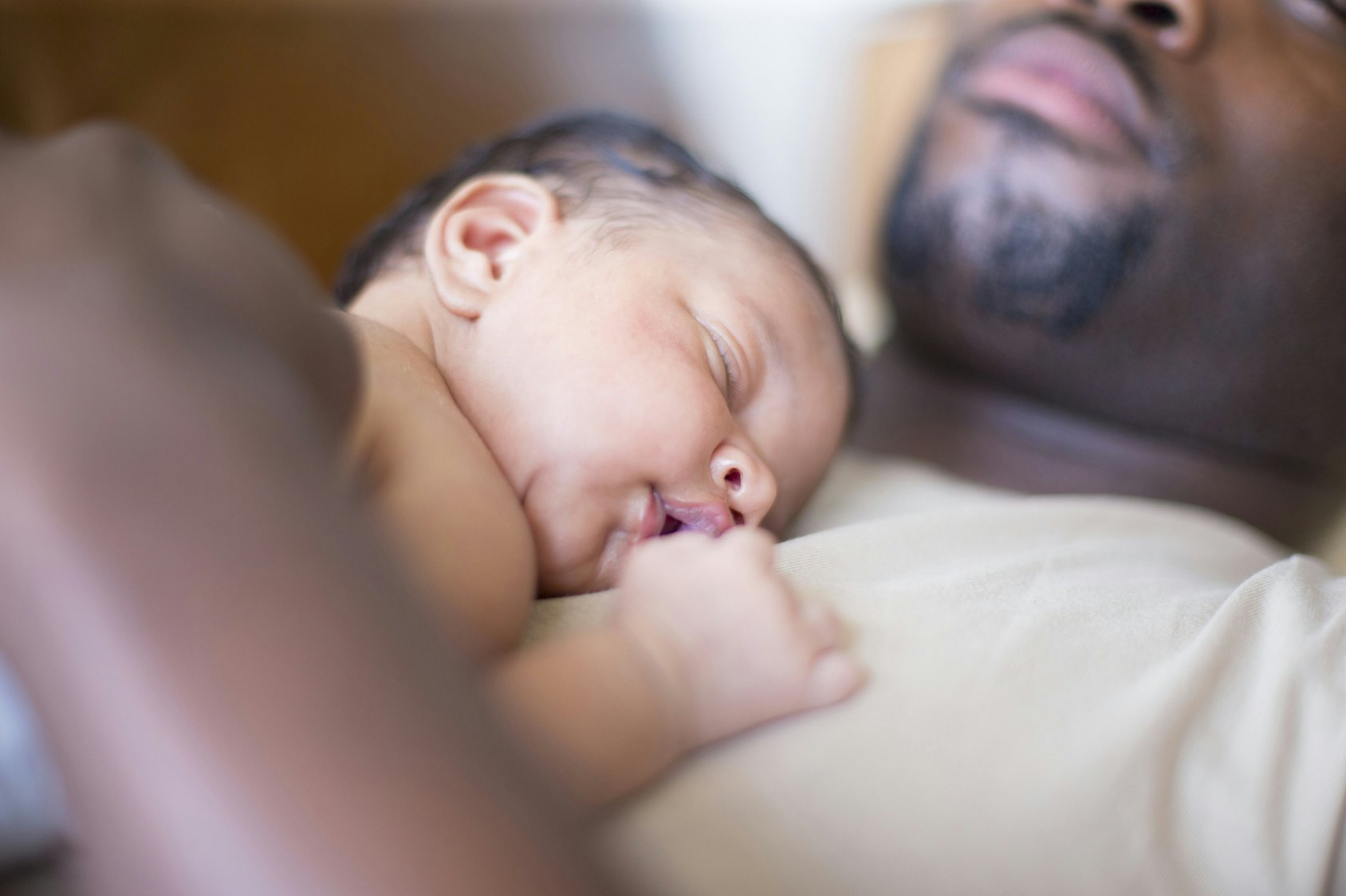 Newborn sleeping hotsell on parents chest