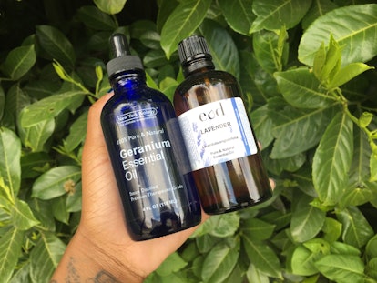 A bottle of Geranium Essential Oil and a bottle of Lavender used for eczema