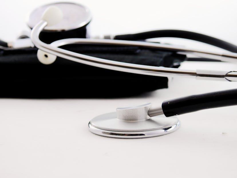 A stethoscope lying on the doctor's desk