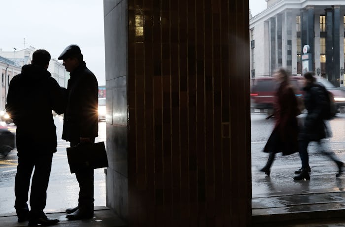 A street near the St. Petersburg Metro where the explosion happened with people walking and talking ...