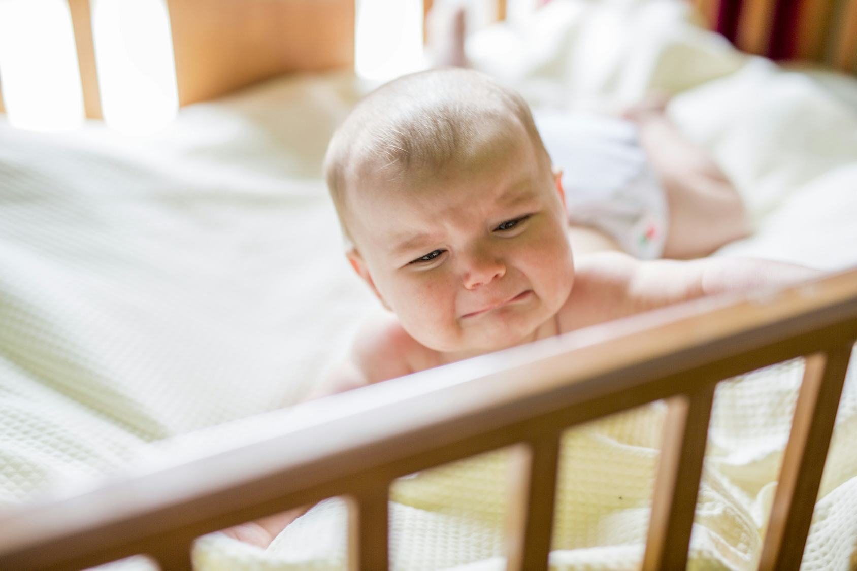 Here's Why Your Baby Wakes Up Crying, According To Science