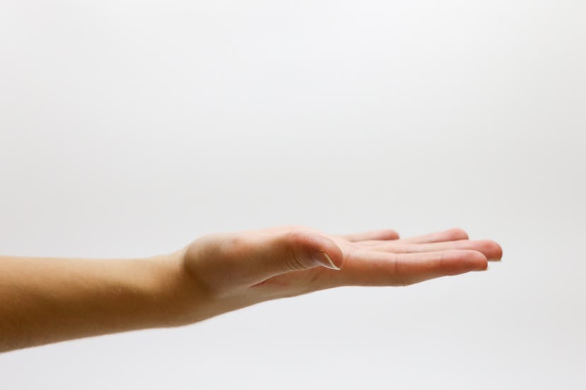 A pre-diabetic woman's hand stretched out as she experiences numbness and tingling