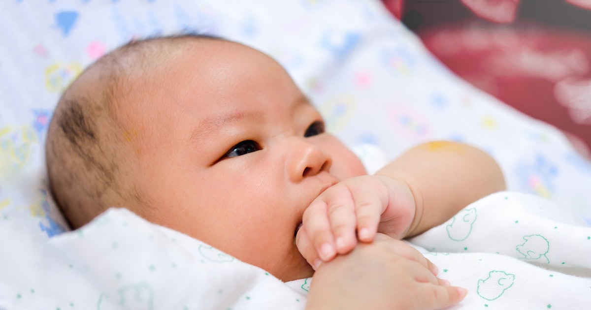 Why Is My Baby Eating Their Hands? There Are A Few Reasons Why Is My Baby Eating Their Hands? There Are A Few Reasons