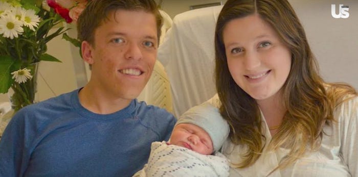 Zach and Tori Roloff with their new baby, smiling