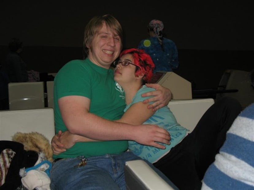 An asexual woman and her husband hugging each other