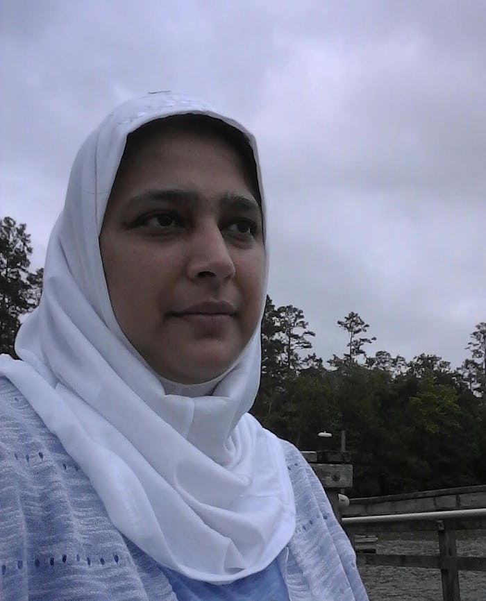 Saadia Faruqi, a Muslim mom, in a white hijab, looking into the distance