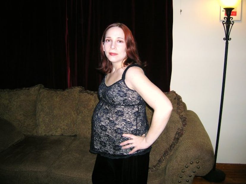 Pregnant woman posing for a picture