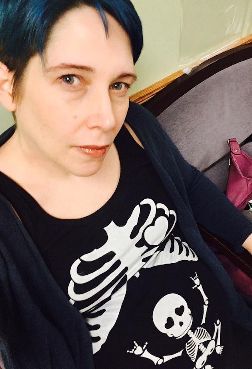Steph Montgomery in a skeleton shirt looking into the camera