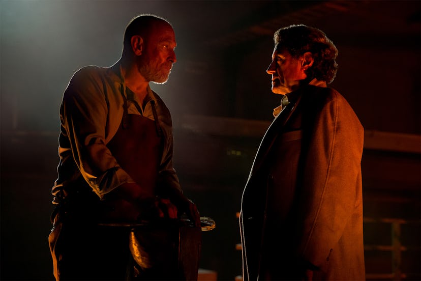 A scene from the American Gods show where two actors are facing each other and conversating