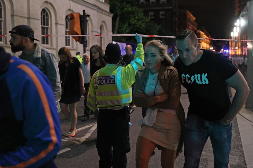 Man and woman walking after London Bridge Attack