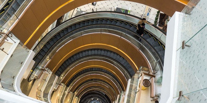 This 7-Story Tall Spiral Escalator Is More Intense Than Most Roller ...