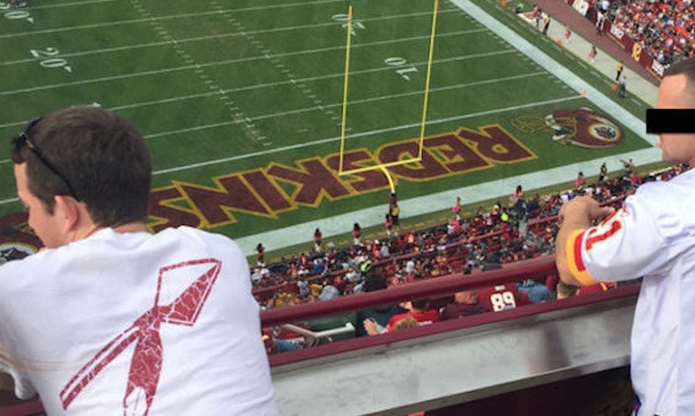 Woman Caught Giving A Guy A Blowjob In Public At A Football Game (NSFW