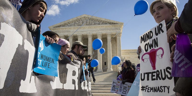 In The Two Weeks Since SCOTUS Heard An Abortion Case, 5 Laws Changed